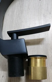 New Mixer for Basin, new in original box. Table View.