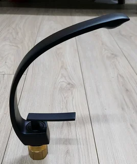 New Mixer for Basin, new in original box. Table View.