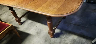 Extendable oak dining table and 6 chairs