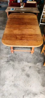 Extendable oak dining table and 6 chairs