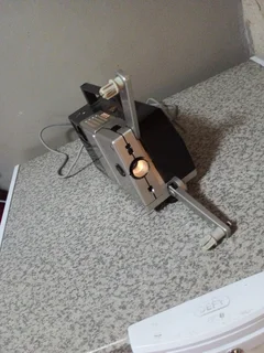 1960,S BAUER T1 SUPER 8MM PROJECTOR WORKS BUT NEEDS A BULP R250