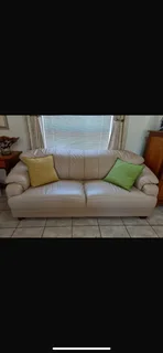 Leather cream couch set with ottoman