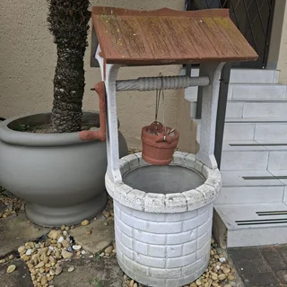 Wishing well garden ornament