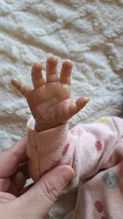 Life like newborn doll,excellent condition