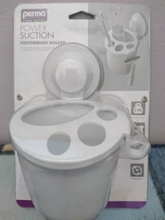 Toothbrush And Power Suction Toothpaste Holders Available For Sale.