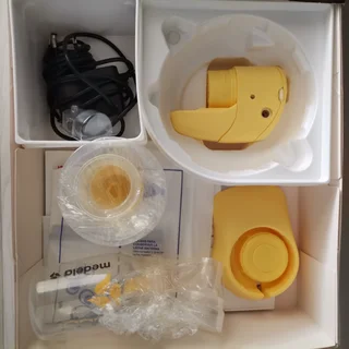 Medela Mini Electric Breast Pump Machine Available For Sale.