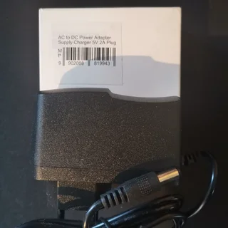 AC to DC Power Adapter Supply Charger 5V 2A Plug Available For Sale.