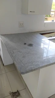 Kitchen Cabinets,TV stands and Decking,Tilling and more