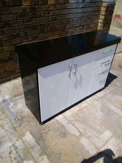 Kitchen Cabinets,TV stands and Decking,Tilling and more