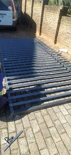 Carports, Parking shades , doors ,Metal Gates,Gazebo,Burglar guards,Palisade Fencing and more ..