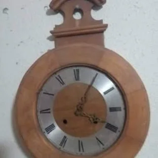 Blessing wall clock with Ansonia movement with chime.