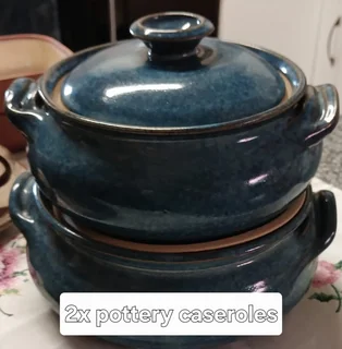 Blue casseroles with lids