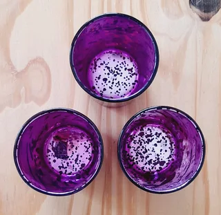 Purple and Silver Candle Holders with feather rings. 3 of each