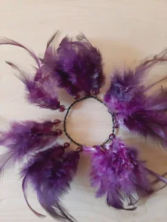 Purple and Silver Candle Holders with feather rings. 3 of each