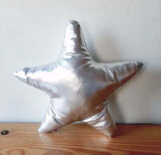 Silver Star Shaped Cushion.