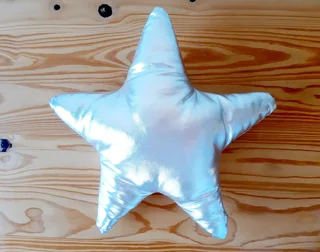 Silver Star Shaped Cushion.