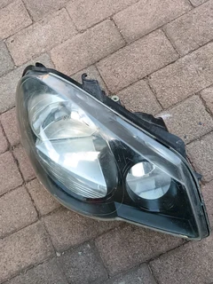 Polo vivo right headlamp