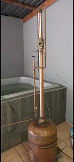 Copper reflux still