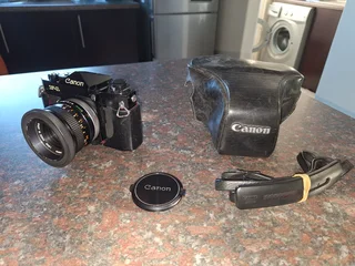 F1 Canon camera plus additional fish-eye lens Optron VA 0310