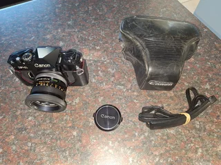 F1 Canon camera plus additional fish-eye lens Optron VA 0310