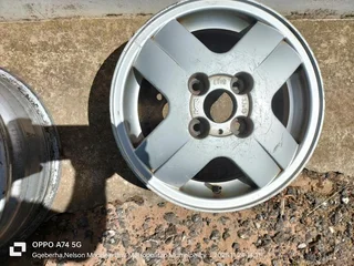 Two Land Rover rims, for Disco series  1 &amp; 2  R 600.00 each negOne unknown Mag rim  R 250.00 neg