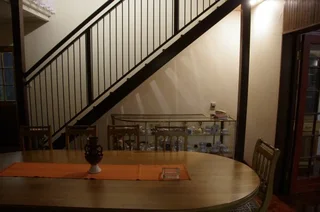 Furnished room to rent for employed singles in 5 bedroom house; can work online; services included.