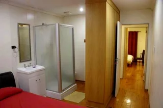 Furnished room to rent for employed singles in 5 bedroom house; can work online; services included.