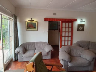 Furnished room to rent for employed singles in 5 bedroom house; can work online; services included.