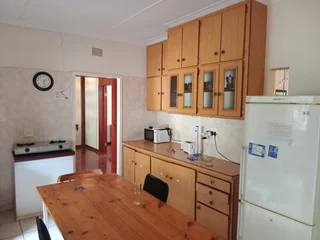 Furnished room to rent for employed singles in 5 bedroom house; can work online; services included.