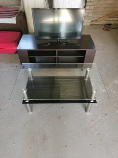 TV stand and TV and coffee table