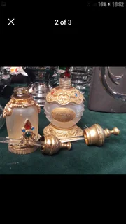 2 X BEAUTIFUL PERFUME BOTTLES  ( REFILLABLE )..IN BRASS CASTING
