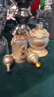 2 X BEAUTIFUL PERFUME BOTTLES  ( REFILLABLE )..IN BRASS CASTING