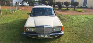 W123 series Merc 200 -1985 for parts. Top gasket blown
