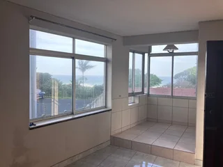 Doonside Beach ~ Open plan  Studio unit -R405 000!  Share block CASH offers. Immediate availability