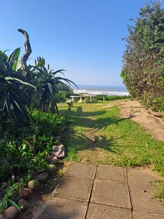 Doonside Beach ~ Open plan  Studio unit -R405 000!  Share block CASH offers. Immediate availability