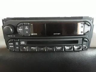 Original Oem Radio & Cd 6 Disc Receiver  (chrysler Corporation)
