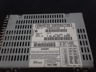 ORIGINAL OEM RADIO &amp; CD 6 DISC RECEIVER  (CHRYSLER CORPORATION)