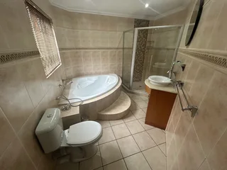 Bath tub, Shower, Toilet and Vanity