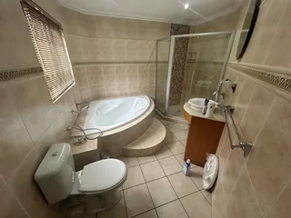 Bath tub, Shower, Toilet and Vanity