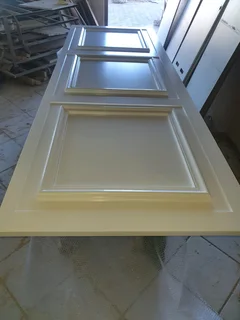 Spraying of bedroom and kitchen cupboard doors etc