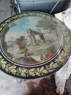 Pedestal base round antique table.