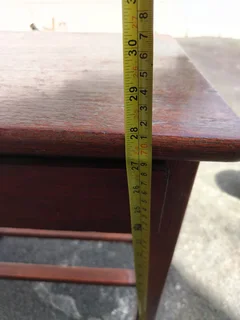 Wooden table with drawer