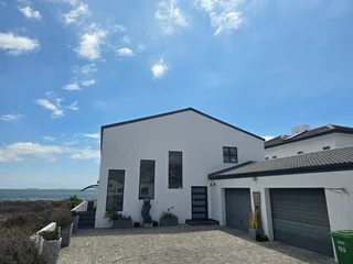 Exclusive Direct Oceanfront Residence with Income-Generating Potential