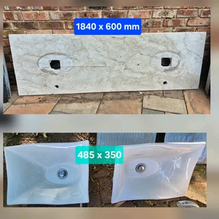 His and Hers basins with granite top