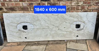 His and Hers basins with granite top