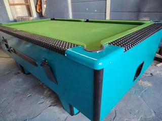 Coin operated pool table