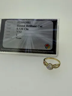 0.53ct Diamond Halo Solitaire Ring