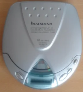 Discman with charger,earphones, battery compartment.