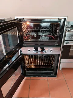 DEFY GEMINI MULTIFUNCTION MIRROR FINISH DOUBLE OVEN FOR SALE