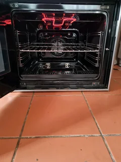 DEFY GEMINI MULTIFUNCTION MIRROR FINISH DOUBLE OVEN FOR SALE